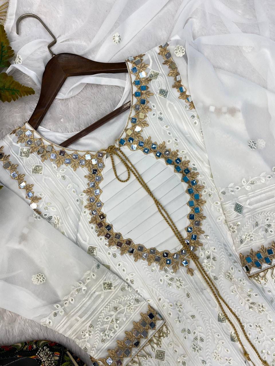 A PREMIUM GEORGETTE EMBROIDERED AND MIRROR WORK TOP AND PENT WITH DUPATTA