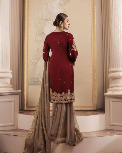 A HEAVY GEORGETTE EMBROIDERED TOP, SHARARA, AND DUPATTA SET