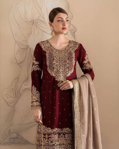 A HEAVY GEORGETTE EMBROIDERED TOP, SHARARA, AND DUPATTA SET